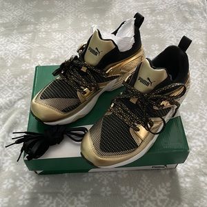 Puma never worn size 8.5 black and gold sneakers